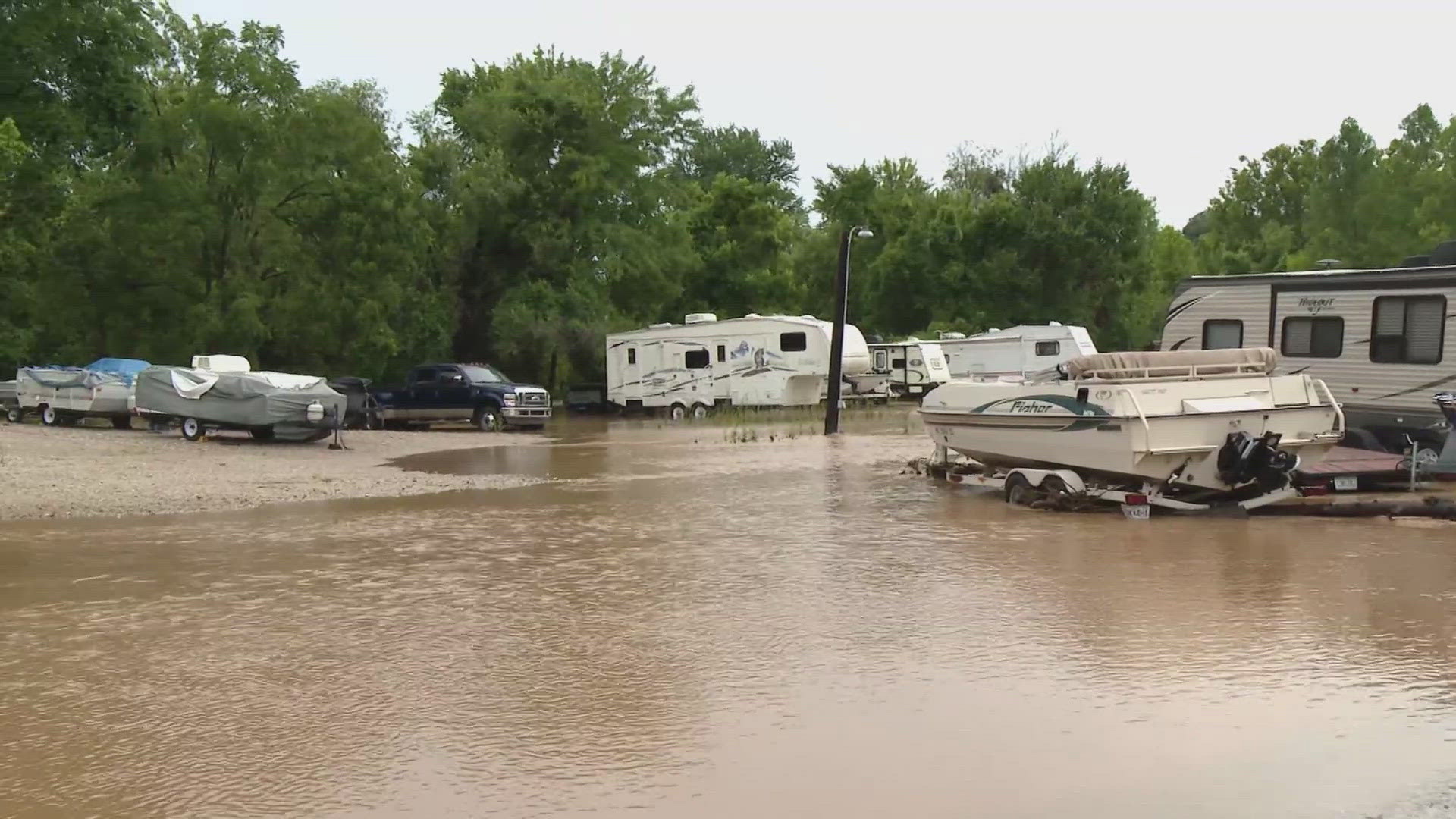 Fire crews showed up to rescue a couple after floodwaters overtook a Jefferson County RV Park.